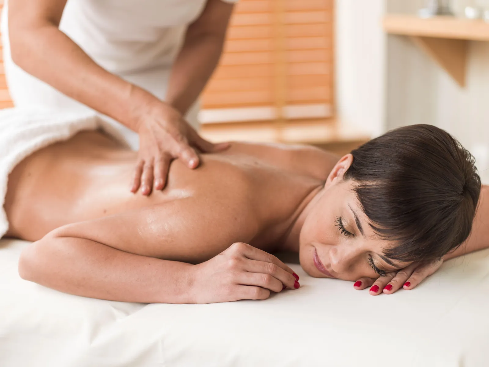 A guest lying face down during a back massage at the Ensana Margaret Island spa