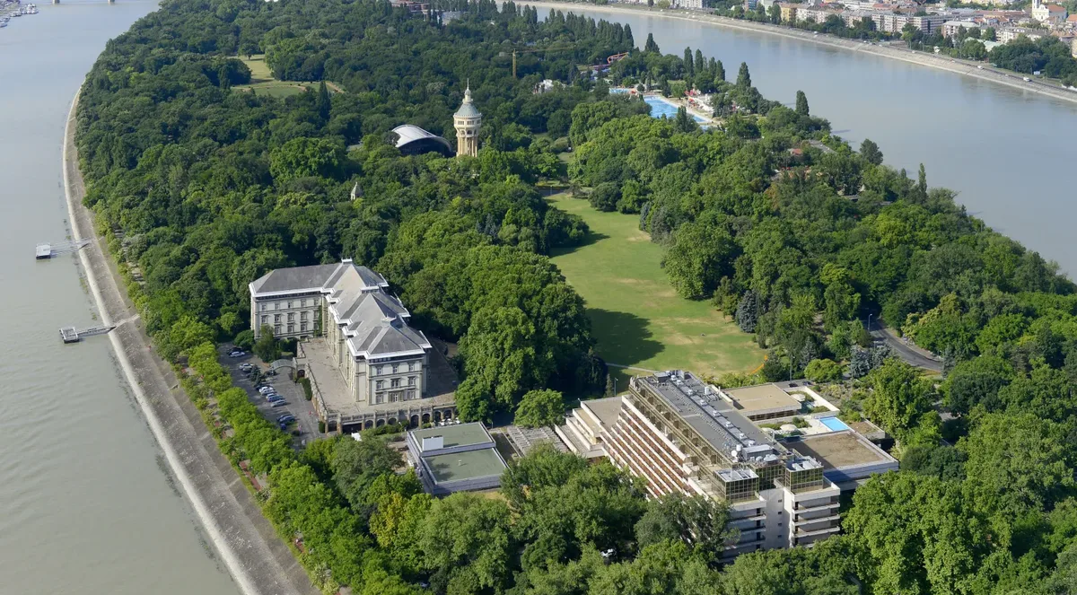 Aerial view of the north end of Margaret Island, with the two Ensana hotels among the trees and the Danube on both sides